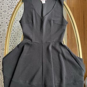 Stretchy Black Business Dress / V- Neck and sinch waist and puff out skirt